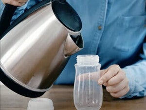 Hvordan tilbereder jeg NAN tilskudsblanding?